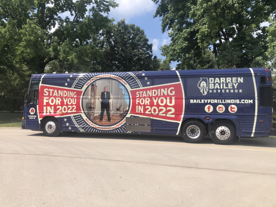 State Sen. Darren Bailey's gubernatorial campaign bus outside of the Illinois GOP's annual rally day at the State Fair on Thursday.