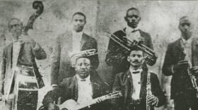 The only known photograph of Buddy Bolden, standing back row and second from left, horn in hand. Also pictured: guitarist Brock Mumford, bassist Jimmie Johnson, clarinetists Willie Warner and Frank Lewis, and trombonist Willie Cornish. Courtesy of the New Orleans Jazz Museum