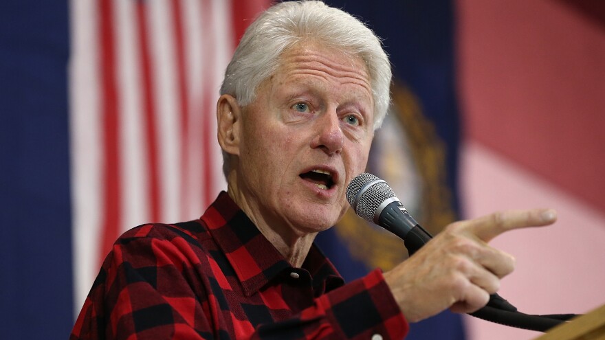 Former President Bill Clinton campaigns for his wife, Hillary Clinton, on Sunday in Milford, NH.