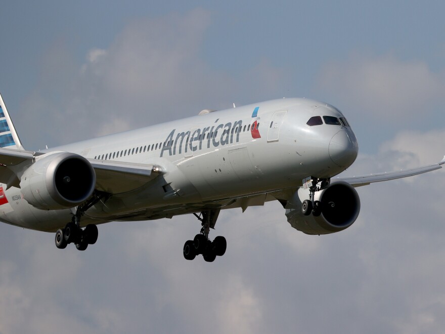 An American Airlines Boeing 787-9 Dreamliner approaches Miami International Airport. In a joint letter, the heads of Boeing and Airbus Americas reportedly called for postponing a planned Jan. 5 rollout of a 5G wireless network.