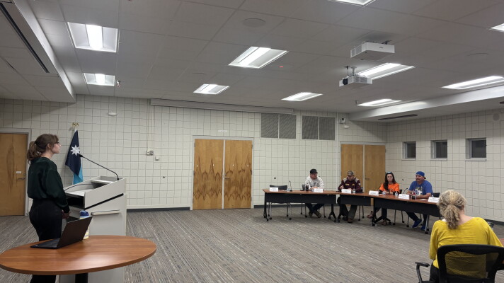 KAXE reporter Emma Krab moderates a forum with candidates for Deer River School Board on Sept. 30, 2026, in Grand Rapids.