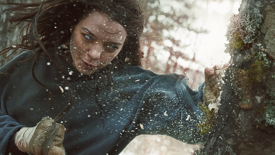 Hanna (Esme Creed-Miles) trains for the day she will have to fight something besides trees.