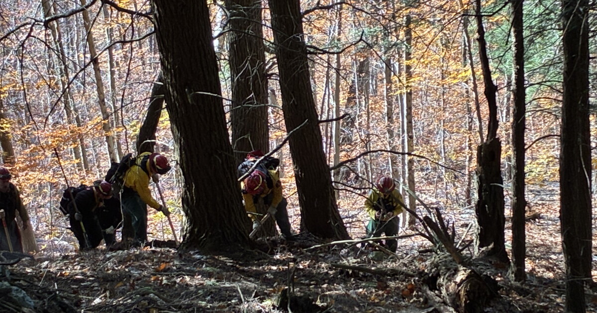 Wildfire on NY-MA border contained; crews now focus on blaze's interior