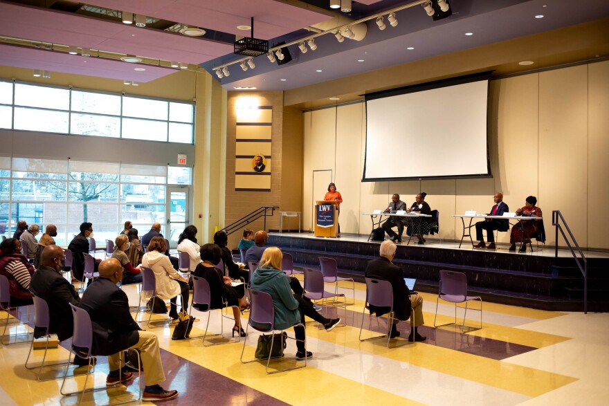 Candidates for the Normandy Schools Collaborative school board speak to the audience.