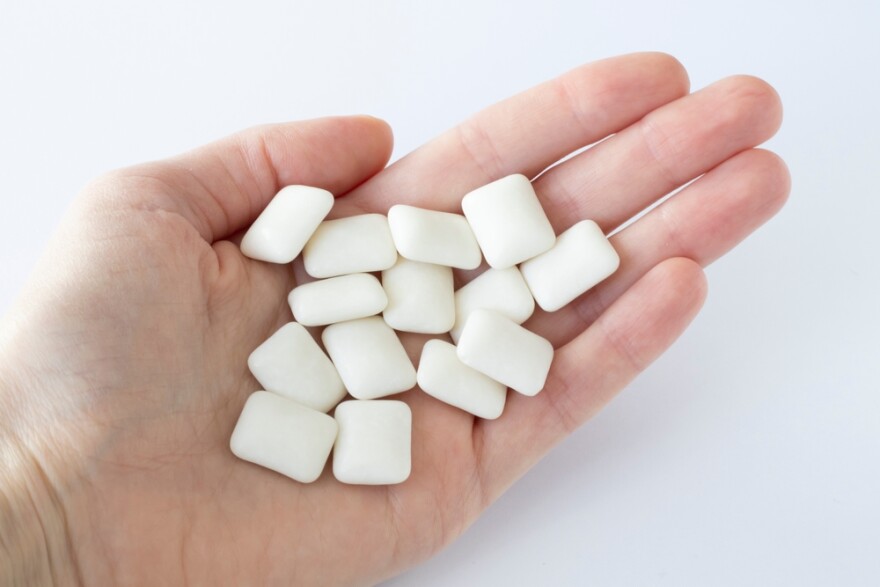 Xylitol is a sugar alcohol found in small amounts of fruits and vegetables and used in sugar-free gum, toothpaste, and baked goods.