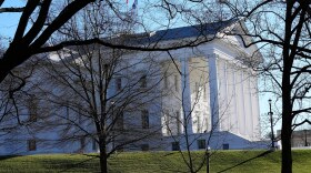 The state and U.S. flags fly over the Virginia State Capitol as the 2024 session of the Virginia General Assembly gets underway, Jan. 10, 2024, in Richmond, Va.