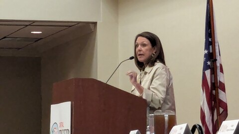 School Board Member Alva Smith speaking before the Capital Tiger Bay Club March 16.