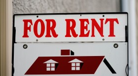 A sign indicating the availability of a home to rent stands outside a building in Philadelphia, Wednesday, June 22, 2022. (AP Photo/Matt Rourke)