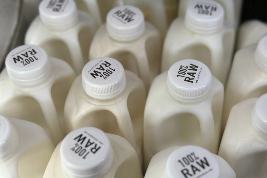 Bottles of raw milk from from Raw Farm of Fresno, Calif., are displayed for sale at a store in Temecula, Calif., on Wednesday, May 8, 2024