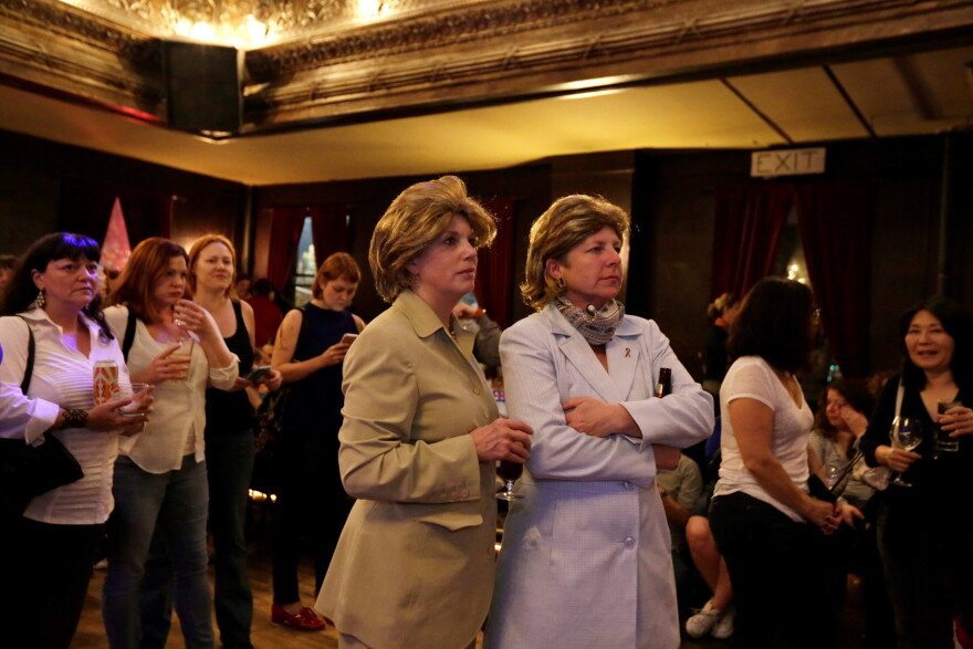 Beth Harrott, left, and Annabelle Richardson, watch the election results come in at The Century Ballroom. And yes, those are wigs (not their real hair) and pantsuits for Hillary, just to be clear. 