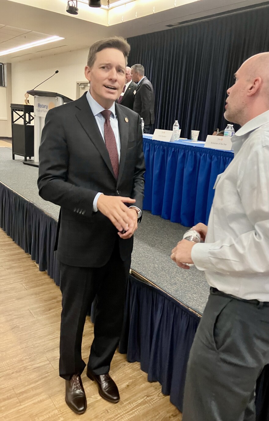 Lt. Gov. Matt Pinnell speaks with a Rotary Club lunch attendee on Wednesday, July 23, 2025.