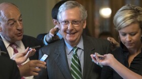 Senate Majority leader Mitch McConnell smiles as he leaves the chamber after announcing the release of the Republicans' healthcare bill which represents the party's long-awaited attempt to scuttle much of President Barack Obama's Affordable Care Act, at the Capitol in Washington, Thursday, June 22, 2017. (J. Scott Applewhite/AP)
