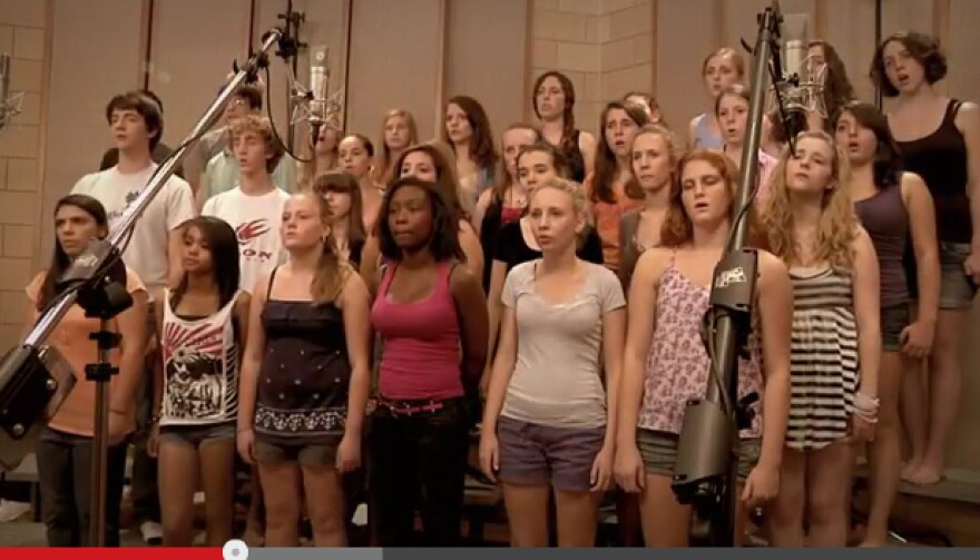 A chorus of teens sings Everybody Hurts by REM. this was another one of Lauren Hodge's chorus projects.