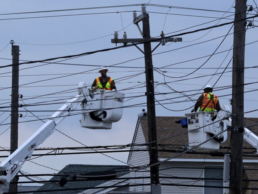 Power Line Work Crews Work To Restore Power, And Explain The Delay | KMUW
