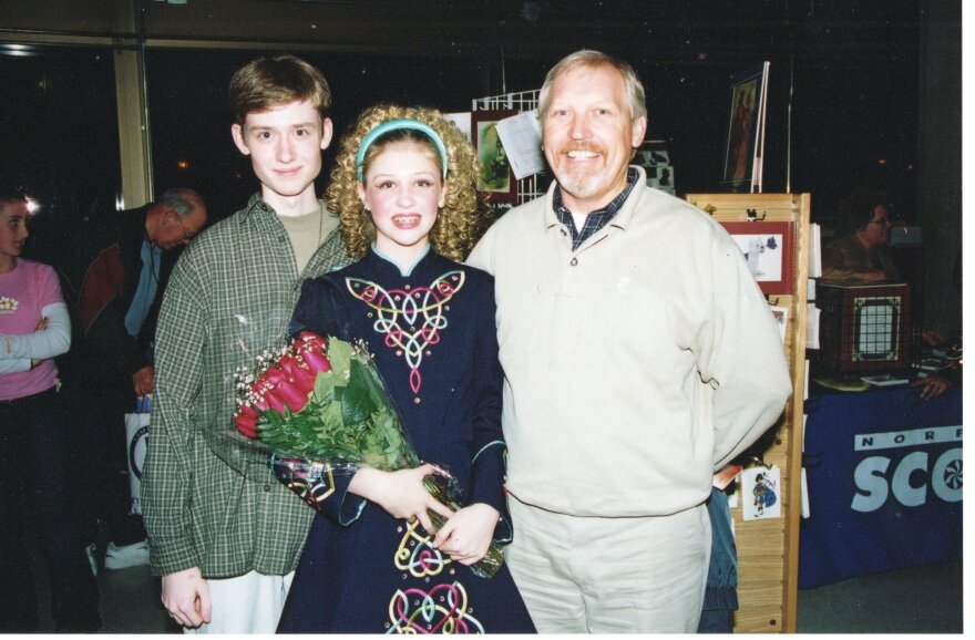 Dancer Sara Rhodes Zimmerman with her brother Tyler, left, and father, Kevin, right, in 2003 at the Virginia International Tattoo.