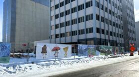 Grant-funded art panels created by local artists surrounding construction site in downtown Anchorage. 