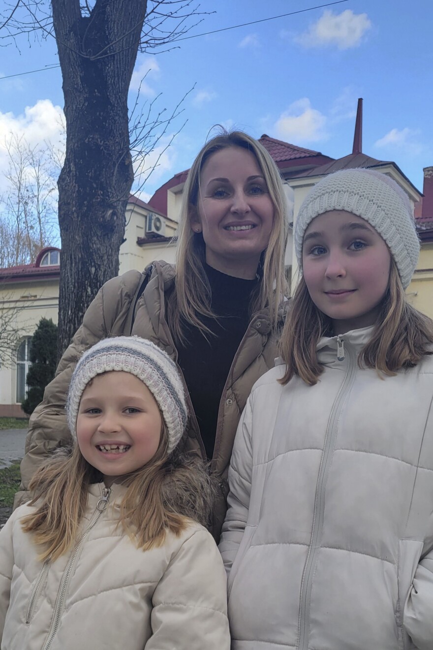 Kateryna Klevtsova and her two daughters, 11-year-old Maria and 7-year-old Nadia, had to leave their hometown Kharkiv as Russian forces increased their attacks in eastern Ukraine.