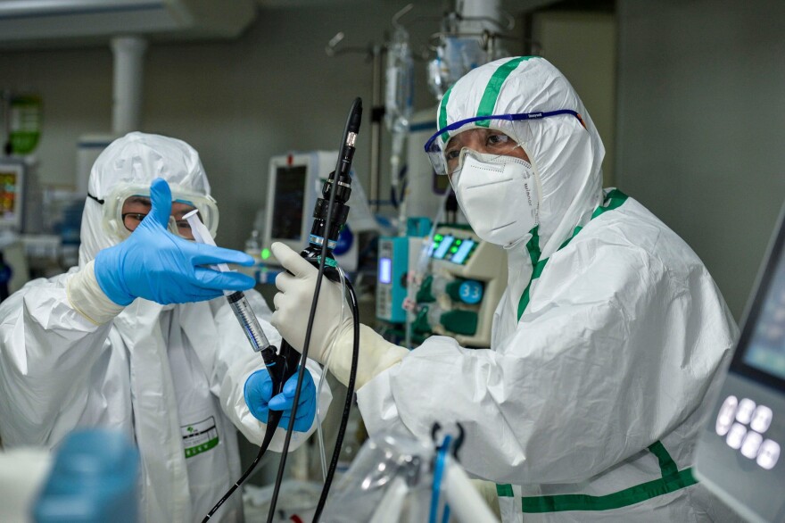 We discuss why thousands of health care workers in China seem to be bearing the brunt of the coronavirus. (STR/AFP via Getty Images)