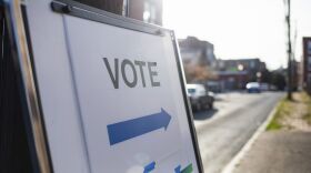 A sign showing people where they should cast their ballots for an election.