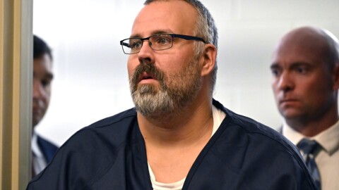 Shawn 'Mickey' Stines is led into the courtroom for a hearing after being arrested and charged with murdering Judge Kevin Mullins.