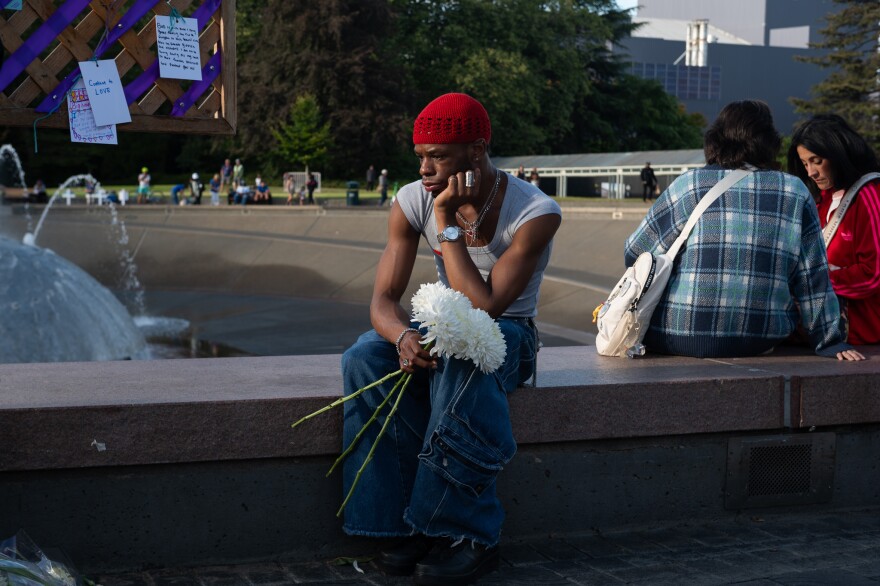 Along with messages, many people left flowers to honor the Seattle Center shooting victims.