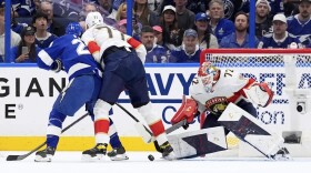 Florida Panthers goaltender Sergei Bobrovsky (72) makes a save as defenseman Niko Mikkola (77) clears Tampa Bay Lightning center Brayden Point (21) from a rebound during the first period in Game 2 of an NHL hockey Stanley Cup first-round playoff series, Thursday, April 24, 2025, in Tampa.