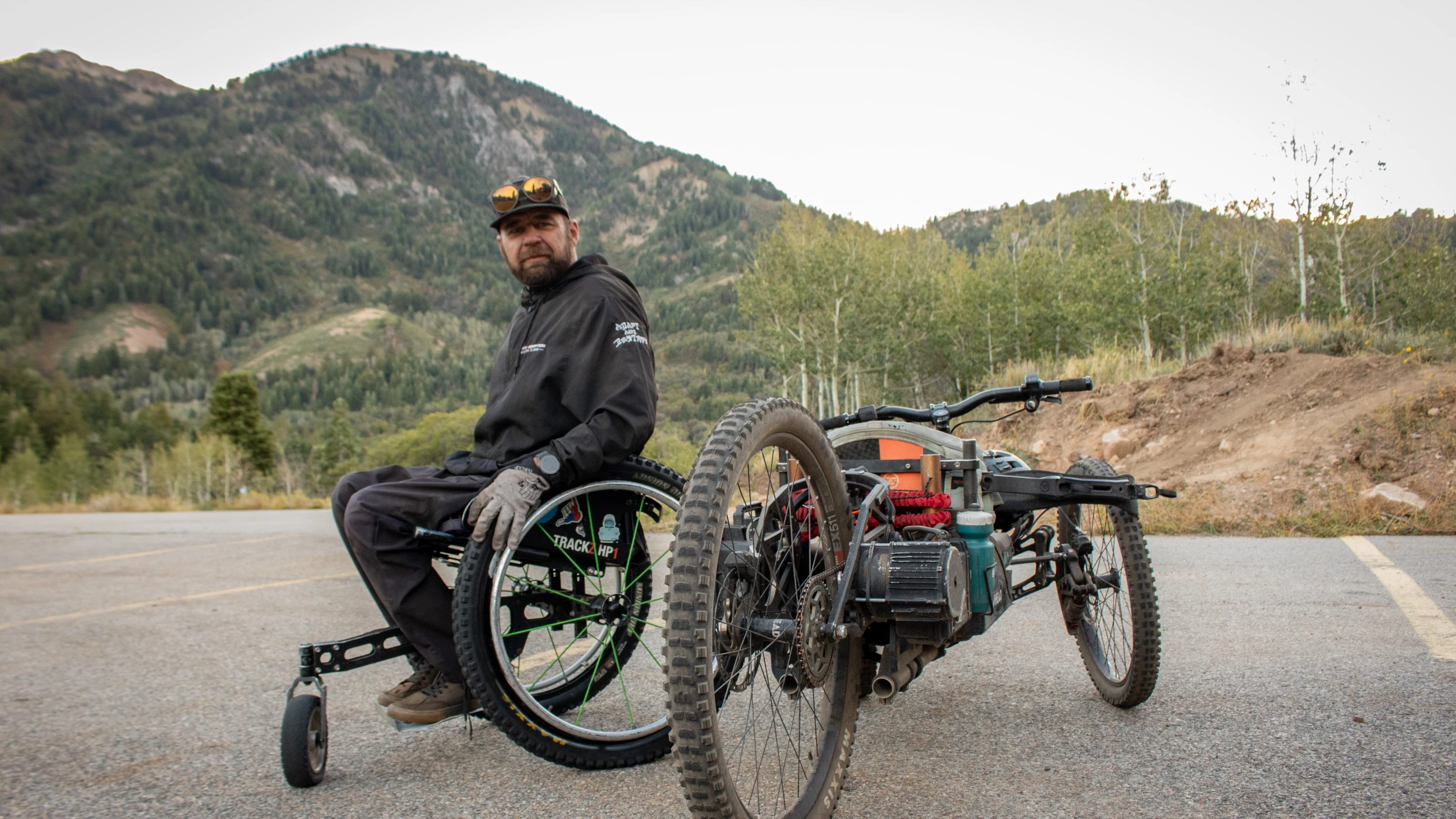 Marshall Evans next to his adaptive bike after riding Canyon Rim Trail at Snowbasin Resort, Sept. 10, 2026.