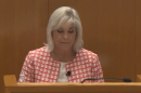 Woman at podium