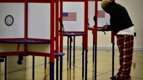 A voter at Brandeis Elementary School fills in a ballot for the Kentucky primary election, last year. The turnout in the 2023 primary was 14.5%. That is close to the prediction for this year's, which includes the presidential primary, and several legislative and judicial offices.