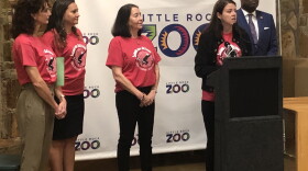 Little Rock Zoo Director Susan Altrui announces the launch of the "Swing Into Action" Green Restaurant Certification Program alongside city officials and Little Rock Mayor Frank Scott Jr.