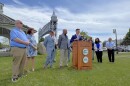 Cape Cod lawmakers called for commuter rail to the Cape — or at least to Buzzards Bay, to start — at a press conference Wednesday led by state Sen. Dylan Fernandes. Speakers included, from left, Bourne Select Board members Peter Meier and Anne-Marie Siroonian, state Reps. Steven Xiarhos and Kip Diggs, and Fernandes. May 27, 2026.