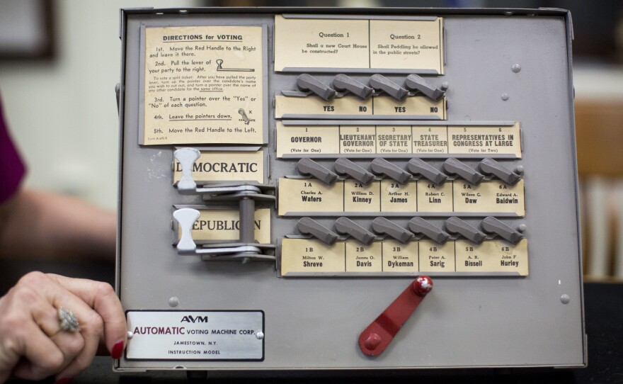 Old-fashioned manual machines such as these were banned after the 2000 presidential election. Now, states are starting to move away from the touchscreen electronic voting machines that don't produce a paper trail that were introduced after that election.