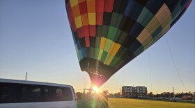 Brian Rohr leads a crew of his hot air balloon staffers and Bemidji State students to set up the 80-foot balloon on campus on Sept. 22, 2026.