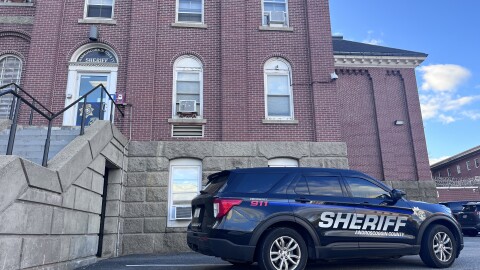 A police car sits outside the Androscoggin County Sheriff's office on Oct. 31, 2023.
