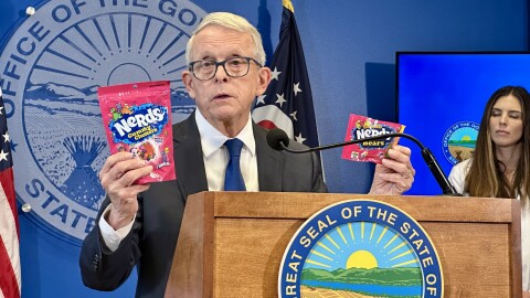 Gov. Mike DeWine with Nerds Gummy Clusters and delta-8 THC that mimics Nerds Gummy Clusters in October 2025.