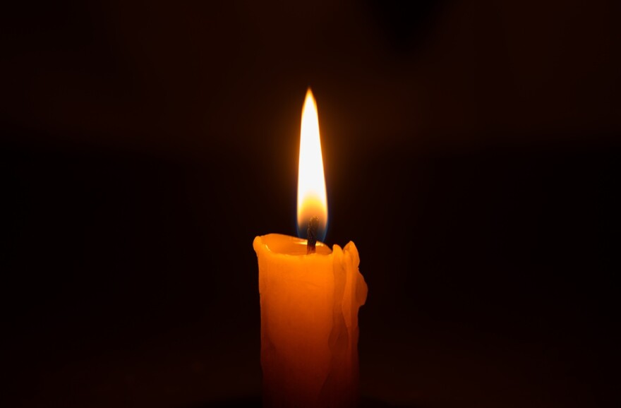 Bright Burning Candle in the Darkness