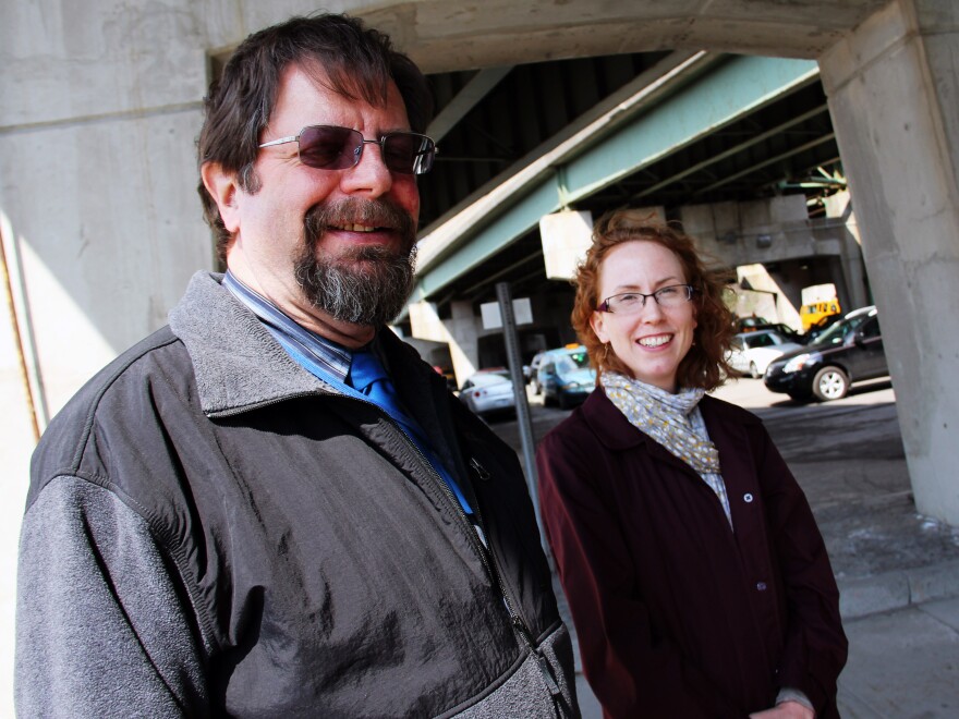 Bill Egloff, I-81 project manager for the New York State Department of Transportation, and Meghan Vitale of the Syracuse Metropolitan Transportation Council stand underneath the I-81 viaduct in Syracuse, N.Y.