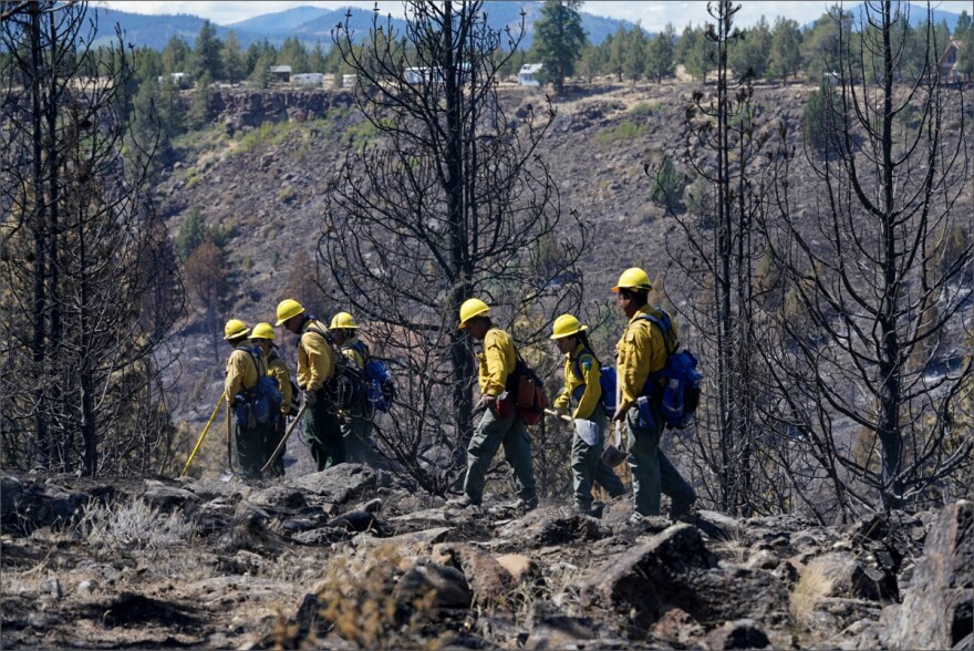 Firefighters work the Graham Fire in central Oregon, which occurred earlier this month.