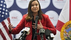 Florida Attorney General Ashley Moody gestures as she speaks, Oct. 18, 2022, in Tampa, Fla. The Florida Supreme Court will be hearing arguments on whether a proposed abortion rights initiative should appear on the ballot in November.