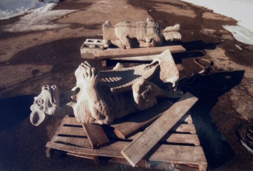 Recast grotesques awaiting installation on the rooftop of Altgeld Hall as part of renovations to the building.