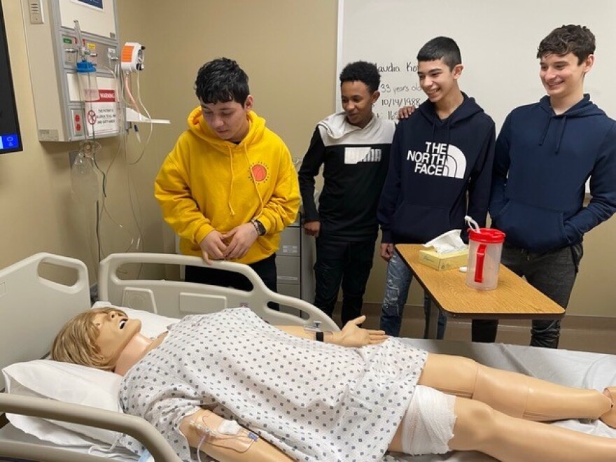 8th-graders from George McGovern Middle School learn about health-care jobs during a Promising Futures Fund college visit to the University of South Dakota.jpg