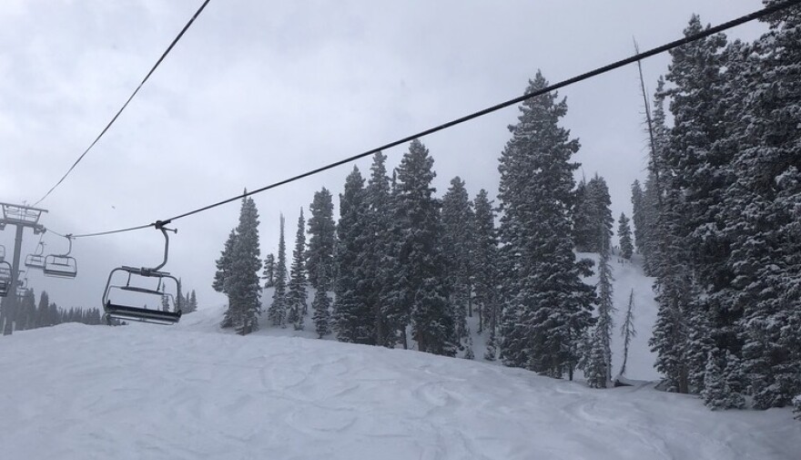 Photo of empty chair on a ski lift