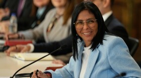 FILE - Venezuela's acting President Delcy Rodriguez smiles during a meeting with a delegation led by U.S. Energy Secretary Chris Wright at Miraflores Palace in Caracas, Venezuela, Feb. 11, 2026. (AP Photo/Ariana Cubillos, File)
