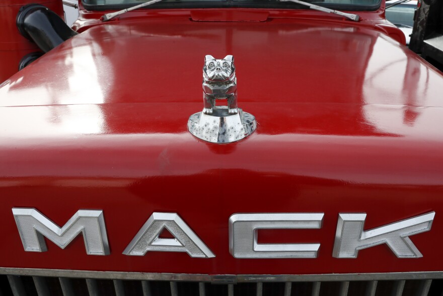 The bulldog hood ornament is seen on a used Mack truck that is available at a lot in Evans City, Pa., Jan. 9, 2020.  The United Auto Workers union has reached a tentative contract agreement with Mack Trucks that covers about 4,000 workers in three states. Mack Trucks confirmed a tentative agreement on a five-year contract early Monday, Oct. 12, 2023 after the UAW announced the deal just before midnight Sunday.