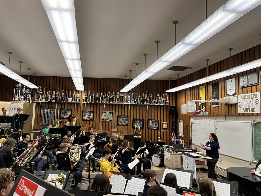 Western Wayne's Band Director Elaine Ort leads her class through a practice for their upcoming Christmas show. Ort is performing during the Macy's Thanksgiving Day Parade this Thursday.