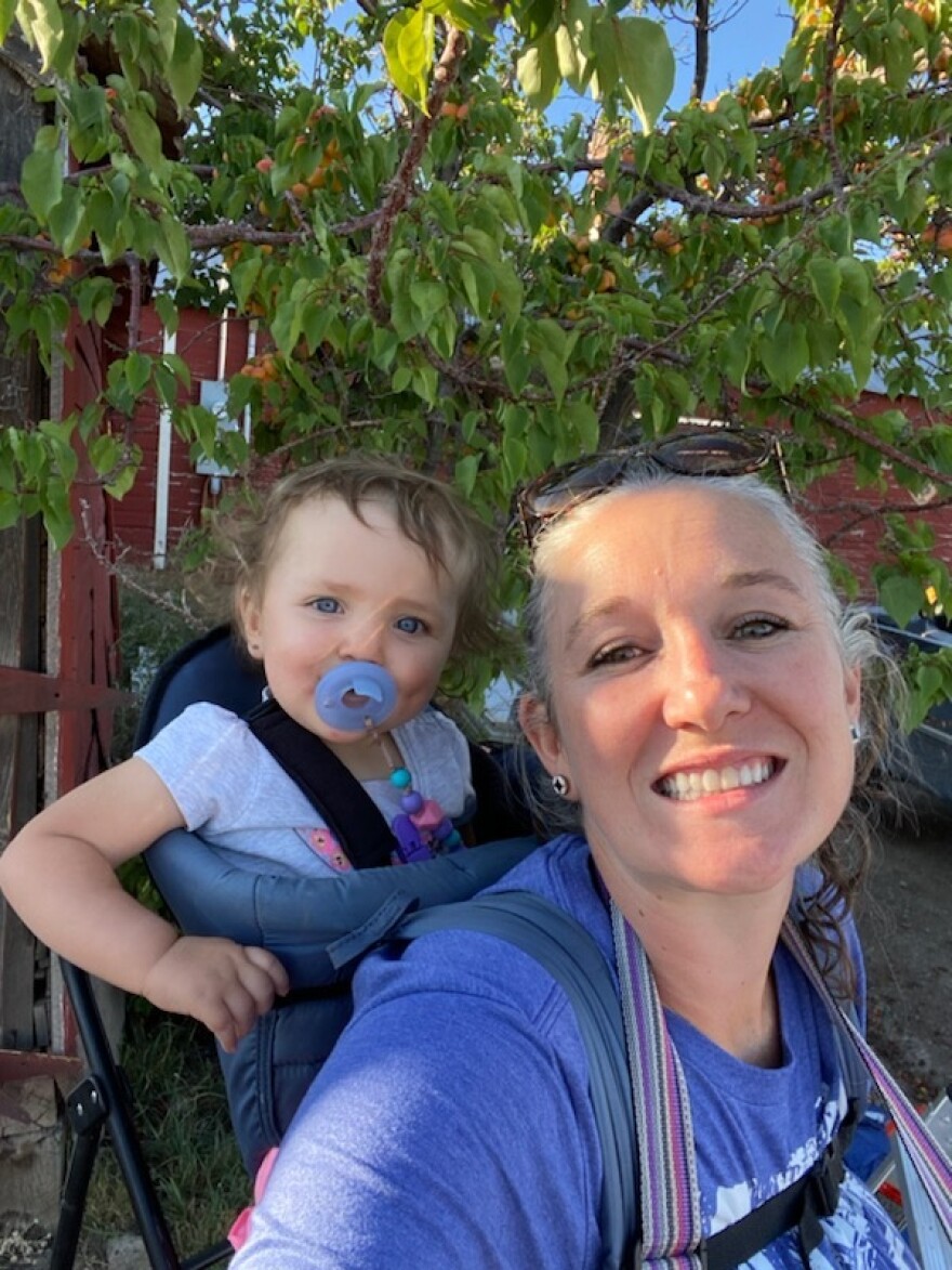 Ashley Lancaster often gleans the extra produce from her own orchard. Sometimes her daughter tags along on gleaning trips too.