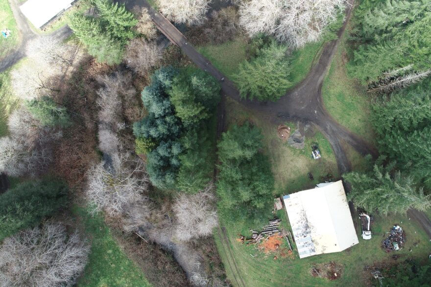 An aerial photo provided by the attorney for Rhonda Proctor shows the large shop at Prindel Creek Farm where Tyler Holloway was shot and killed and two gravel driveways leading to it.