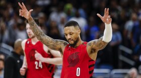 Portland Trail Blazers guard Damian Lillard (0) celebrates after a shot against the Orlando Magic during the second half of an NBA basketball game, March 5, 2023, in Orlando, Fla. 