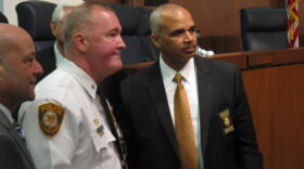 Roland Corvington (right) resigned Monday as head of the St. Louis County board that oversees the police department. Several members of the County Council are hoping police Chief John Belmar (left) will resign.