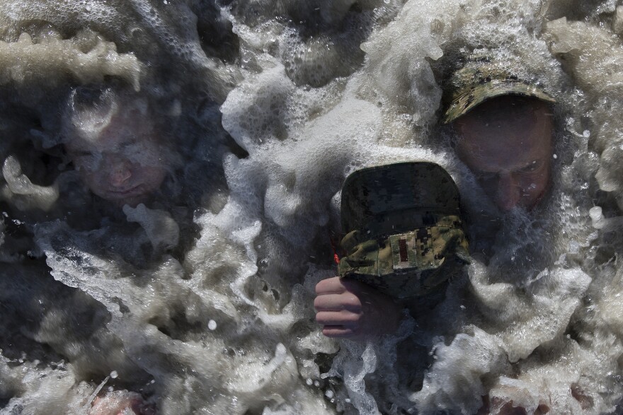 U.S. Navy SEAL candidates participate in Basic Underwater Demolition/SEAL (BUD/S) training in Coronado, Calif., on Jan. 23, 2018. SEALs are the maritime component of U.S. Special Forces and are trained to conduct a variety of operations from the sea, air and land.